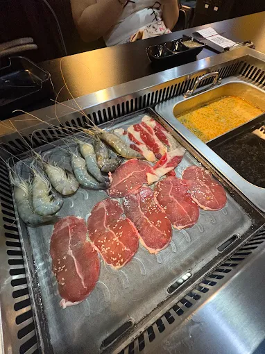 Prawns and beef on the grill